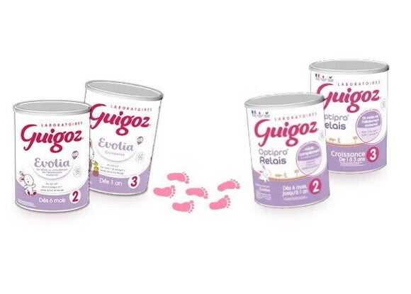 Boîtes de lait infantile Guigoz pour bébés de 6 mois à 3 ans avec étapes numérotées. Boîtes de lait infantile Guigoz pour bébés de 6 mois à 3 ans avec étapes numérotées.