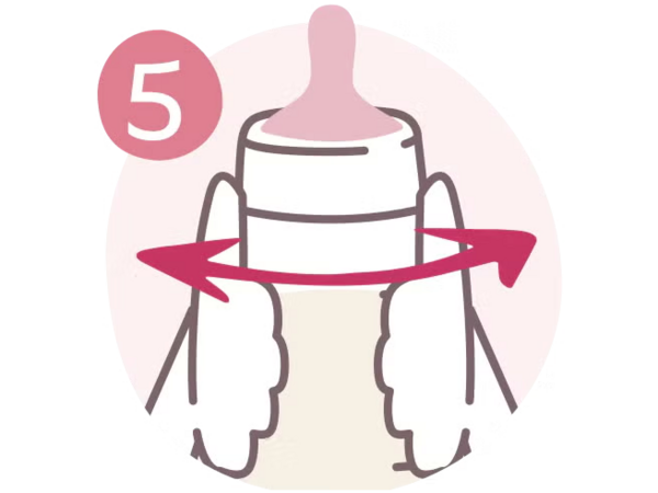 Biberon tenu avec rotation pour mélanger le contenu.